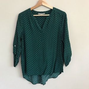 Green blouse with white pattern print